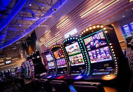Filipino player browsing the amjilli Casino game lobby on a smartphone showing live dealer and slot options